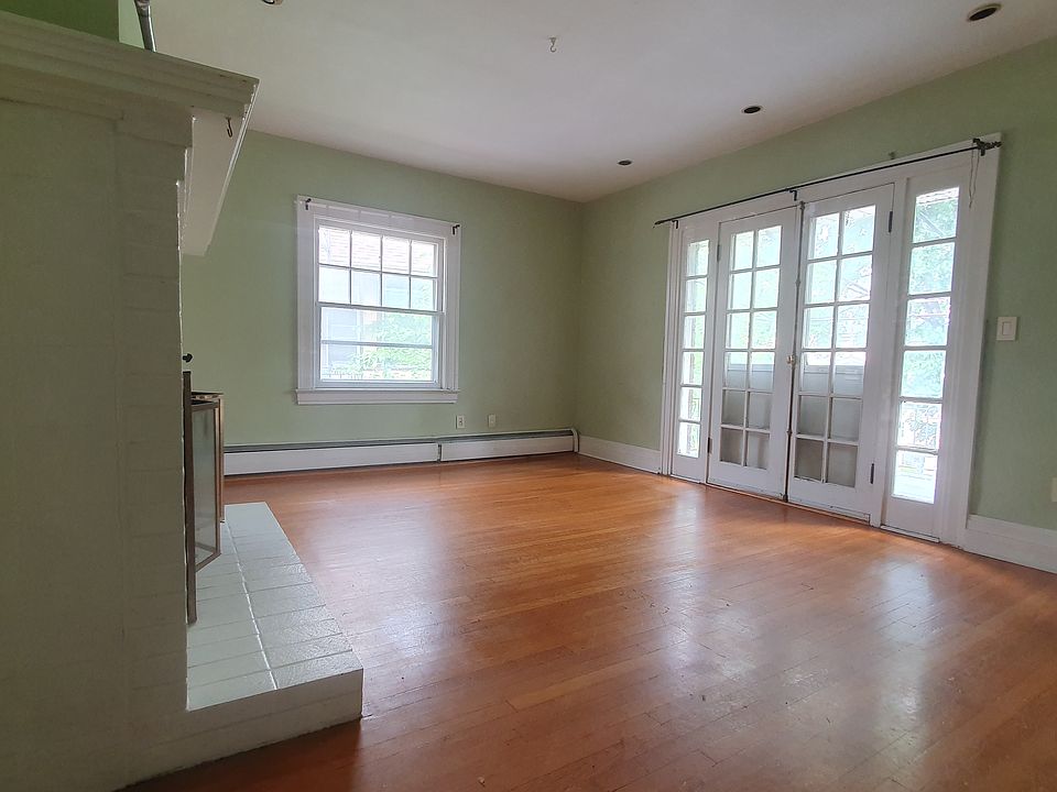 Family room and French doors to private balcony.