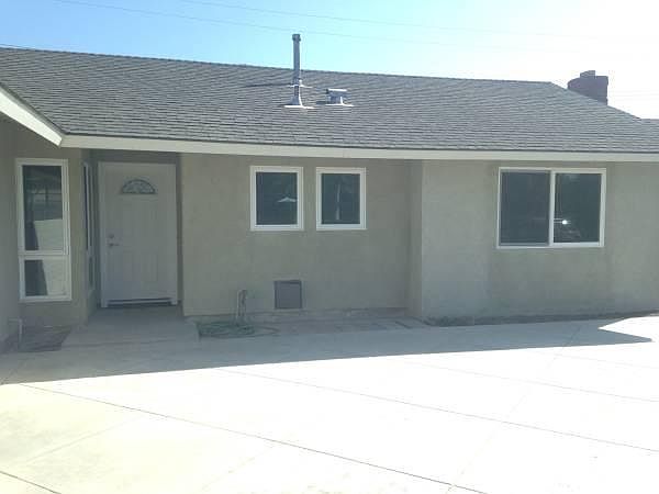 New Stucco & Windows and Front Door