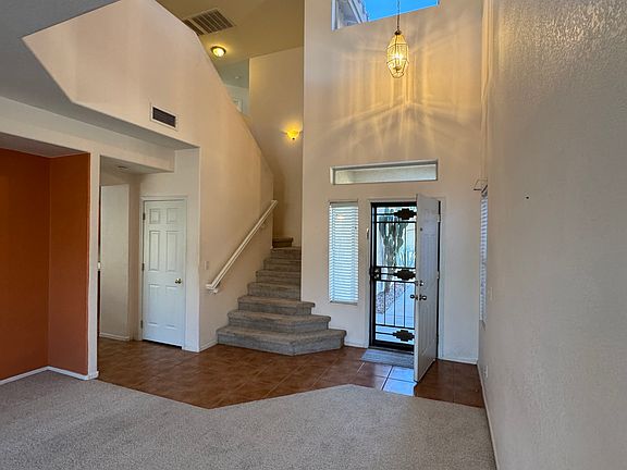 Looking at front door and staircase