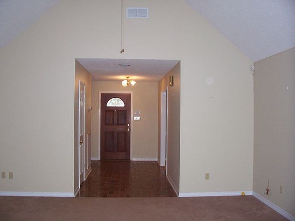 Come on it, large foyer with coat closet.