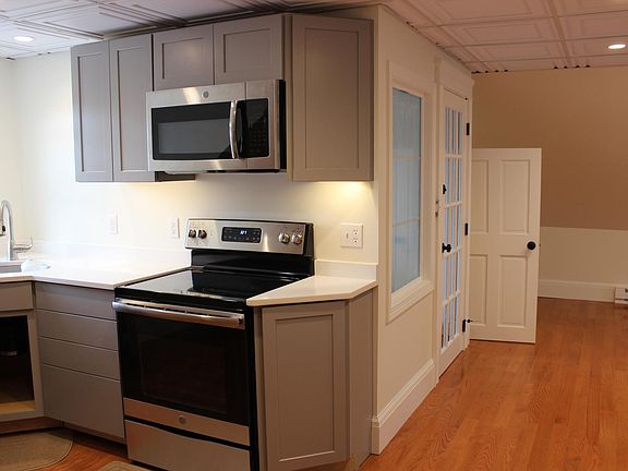 View of rear entrance from partial view of kitchen