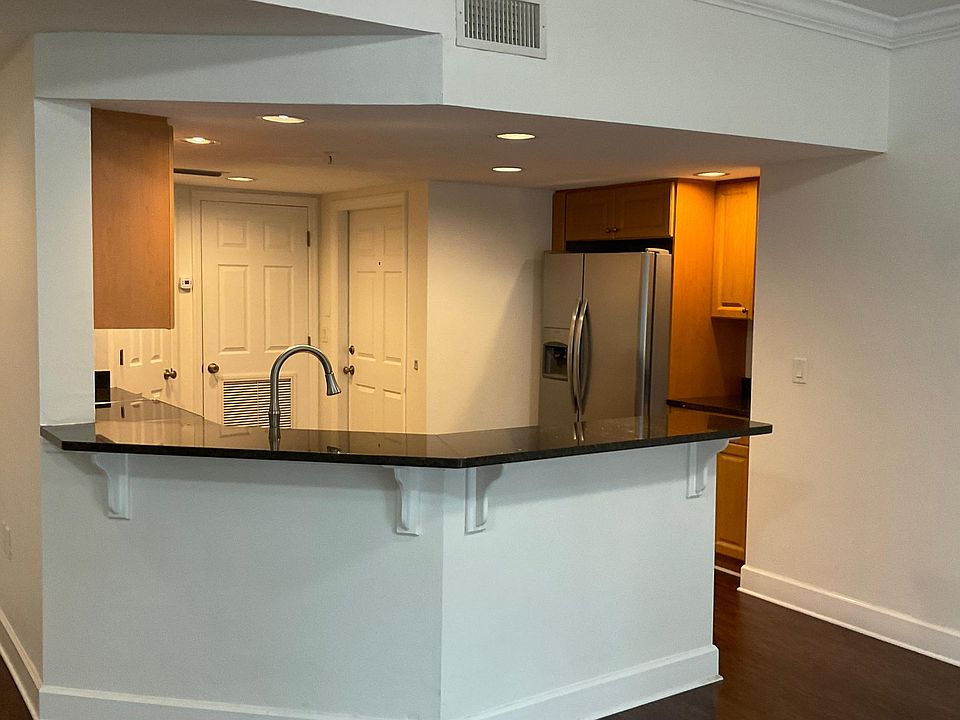 Large kitchen with granite, stainless steel appliances, large pantry