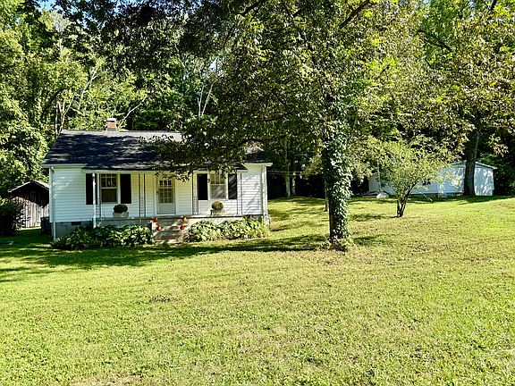 Large front yard with front porch to share the outside