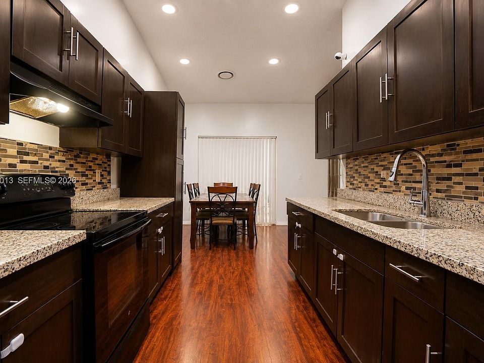 1st image of 940 NE 212th Ter APT 1