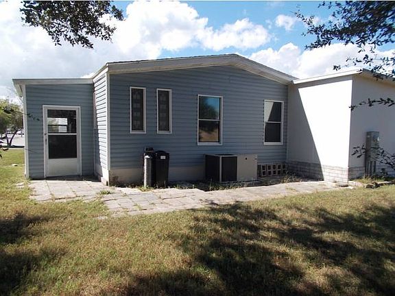 East side, rear patio