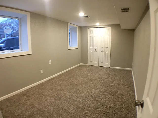 Newly remodeled lower level includes a large bedroom with lots of closet space.