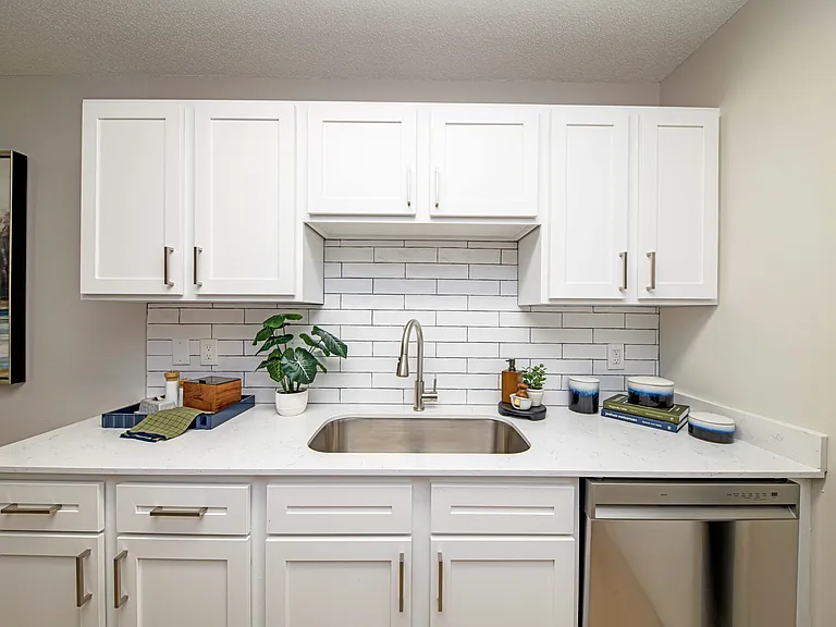 Kitchen with granite counters and modern cabinetry