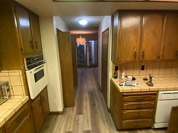 Vintage Kitchen with laundry hookup, (Elect dryer hookup) and pantry.