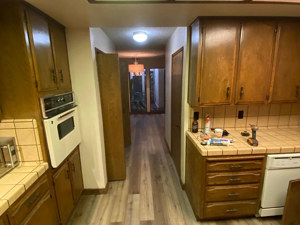Vintage Kitchen with laundry hookup, (Elect dryer hookup) and pantry.