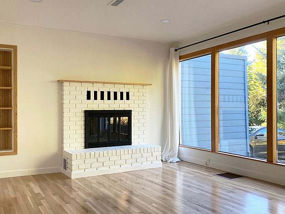Living room. Wood burning fireplace.