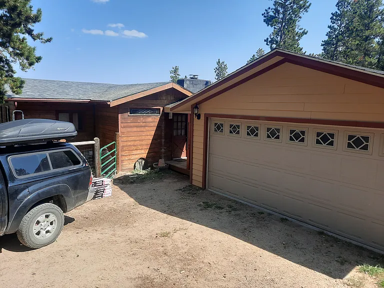 Garage and front entrance. New roof