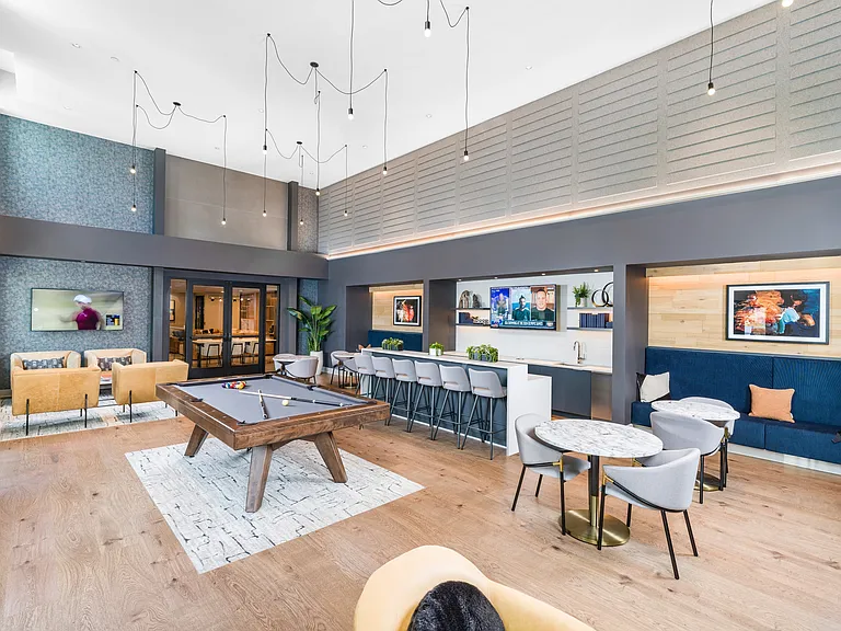Experience the ultimate leisure space at Modera Montville! Our clubroom boasts a poker table, pool table, and TVs, offering endless entertainment and a great place to relax with friends.