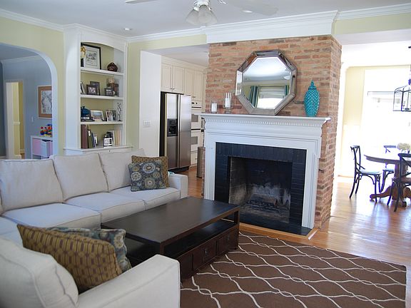 Fireplace b/w family & kitch