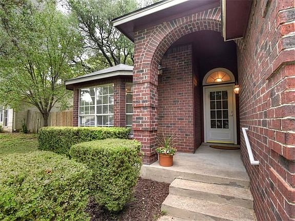 Welcoming front entry with covered porch