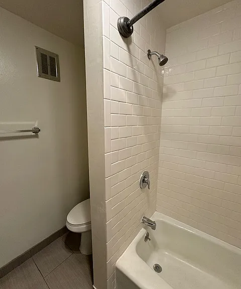White subway tiled shower/tub combo