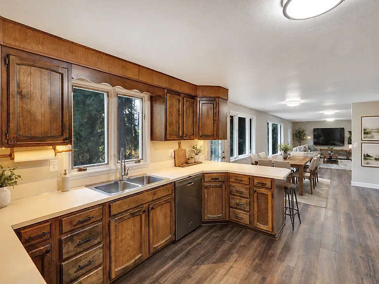 Open concept rear of house - kitchen, informal dining, family room