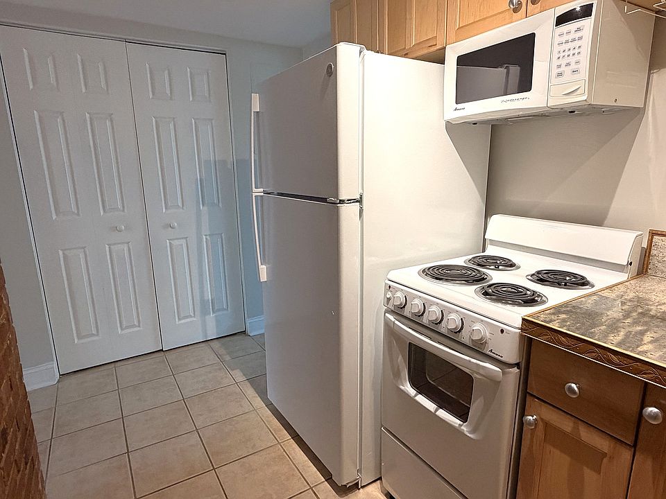 Fully equip Kitchen 
Brand new fridge, range, vented microwave, and garbage disposal.