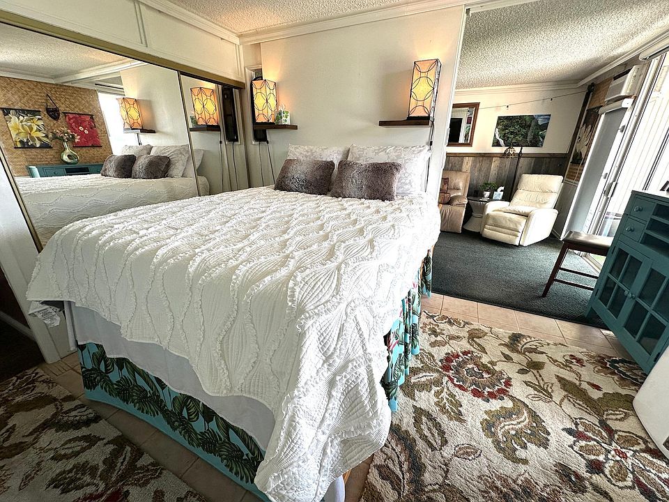 Captain style queen size bed.