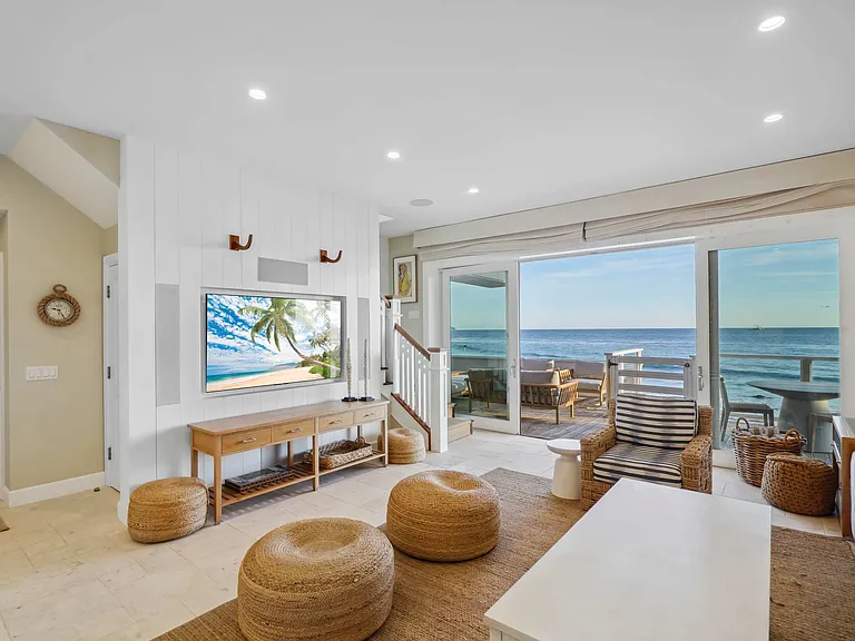 Coastal elegance shines in every detail, from natural tones to stunning views.