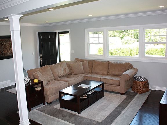 living room just off kitchen and main entrance