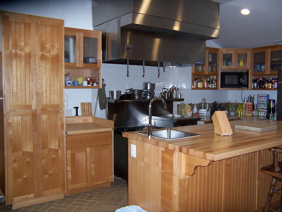 400 sq ft of commercial kitchen and custom alder cabinets (Maple baker's top)