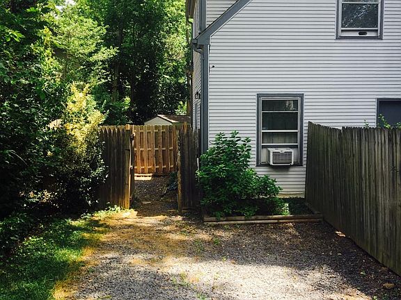 Private driveway with gate to private yard