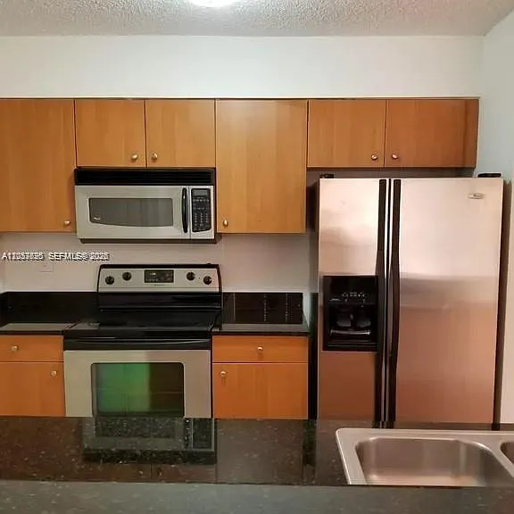 2890 N Oakland Forest Dr #111 — Photo 4