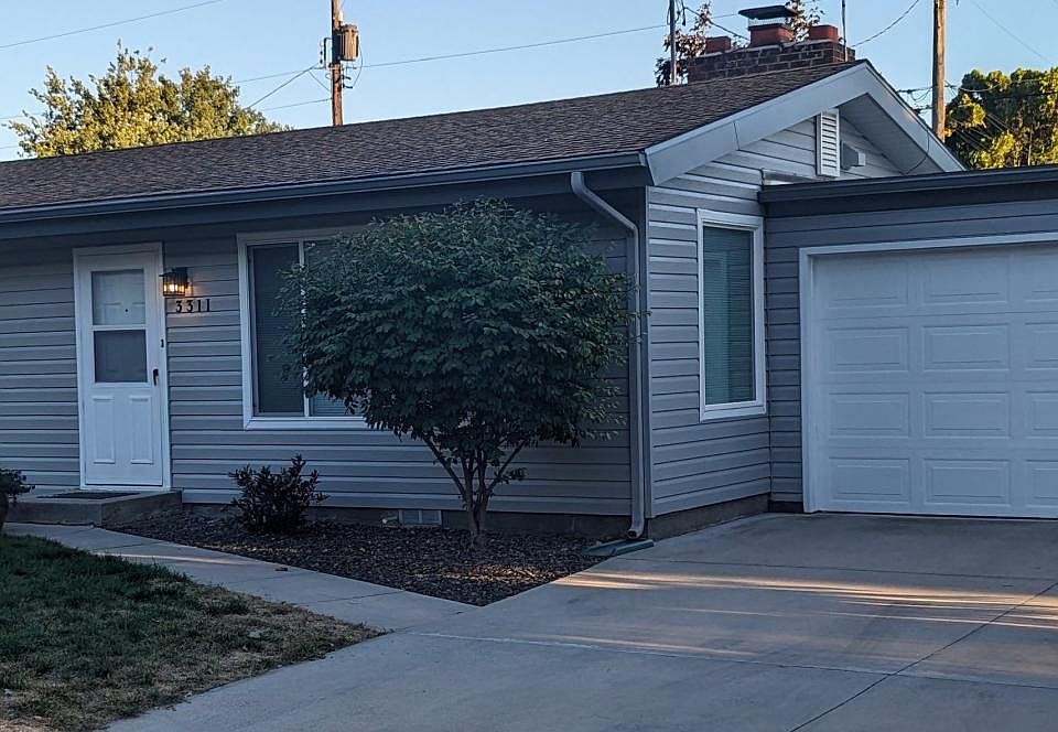 Welcome to 3311 Sunset. Brand new fresh exterior paint.