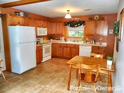 Dining Room/Kitchen
						:
						Porcelain tiled floor, newer cabinetry. Appliances included in sale.