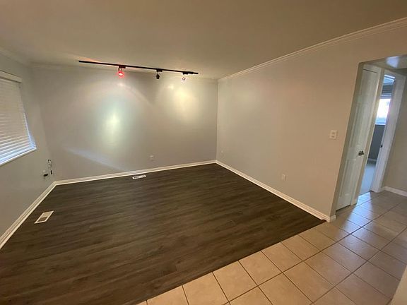 new, durable luxury vinyl plank flooring in the living room. Also, new paint!
