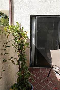 Enclosed Patio off downstairs bedroom