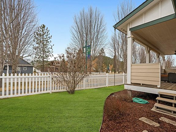 backyard patio and grassy area