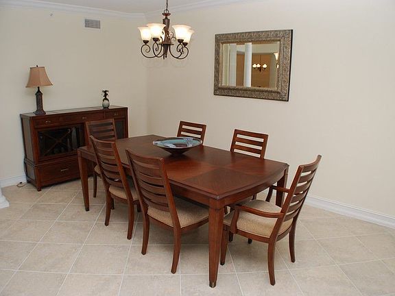 Dining area is tile with a touch of elegance and plenty of room to entertain