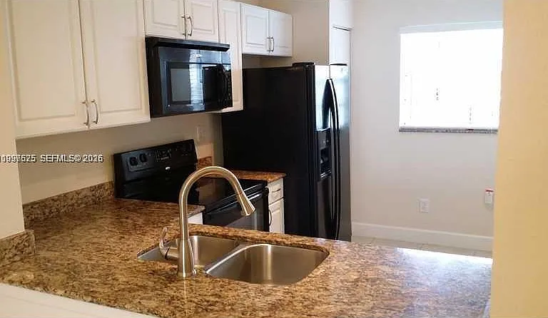 438 NE 210th Circle Ter #103-4B — Photo 2