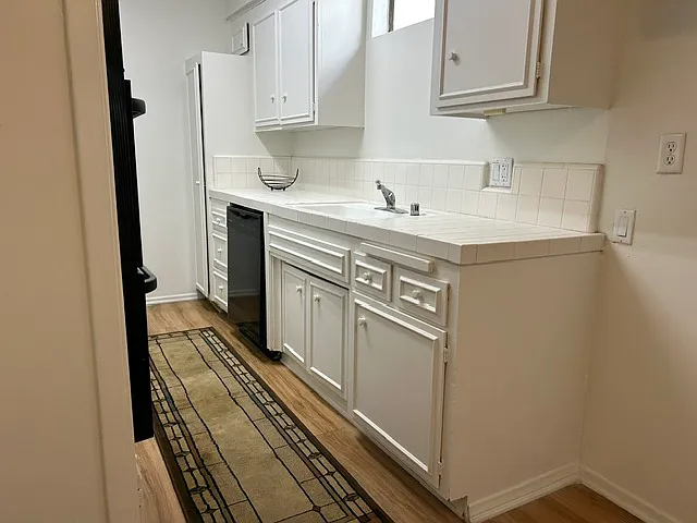 Amazing counter space and tons of cabinets.