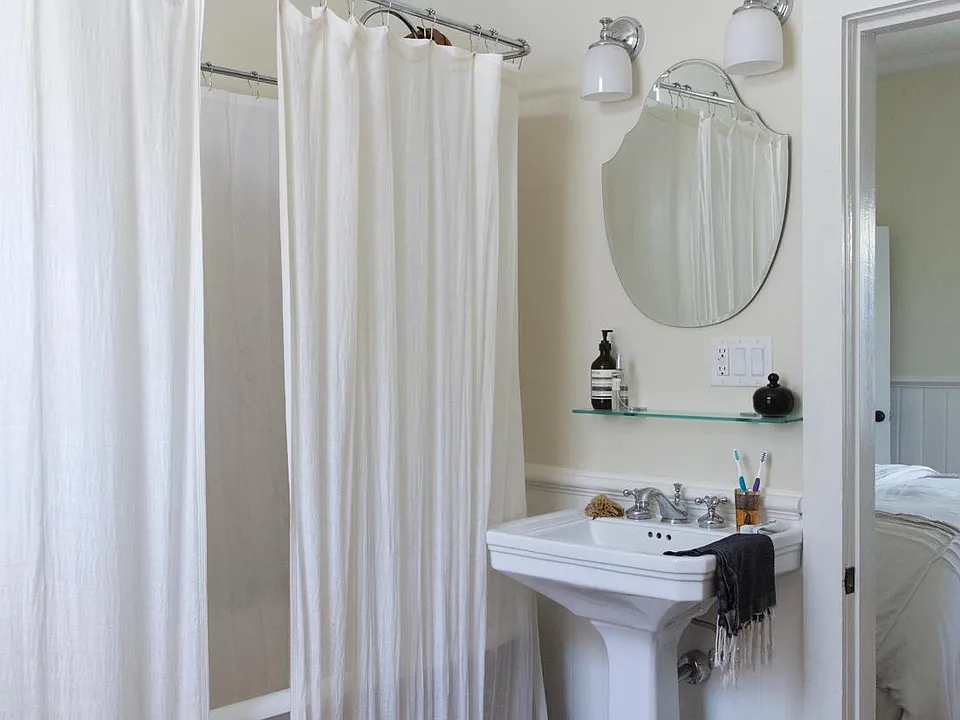 Bath with clawfoot tub and private water closet