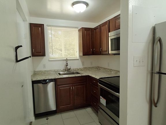 Fully equipped kitchen including dishwasher, oven, microwave