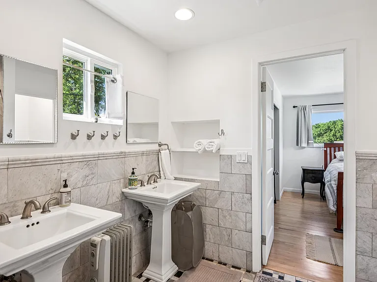 Upstairs marble bathroom