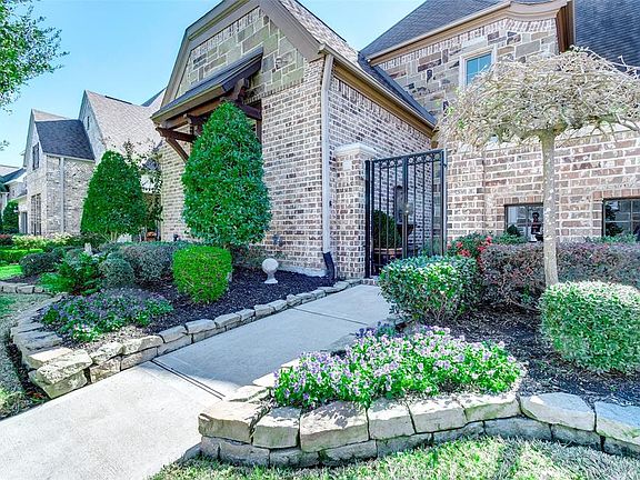 Beautiful mature landscaping in the front and back.