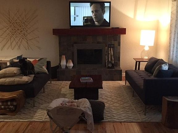 Living room with bcozy fireplace