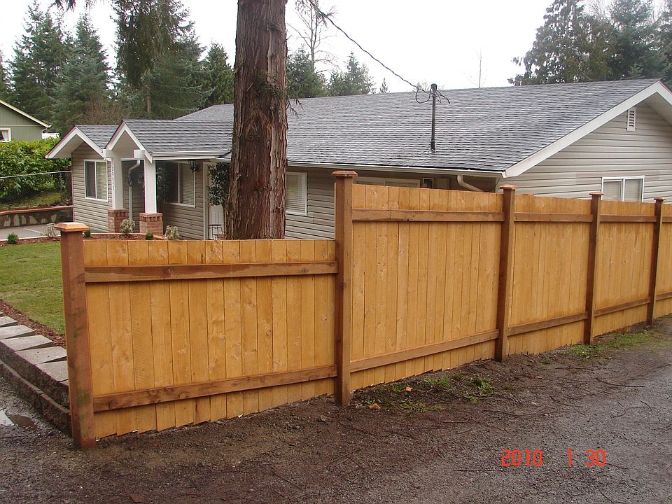 Front of the home and fence