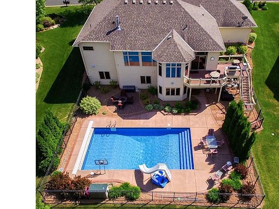 The total perfect home for a lifestyle of joy.   Includes a 36'ax18' in-ground "Sport Pool" with easy entry stairs.  Home is sited on premium 1/2 acre heavily wooded for privacy beyond the pool.