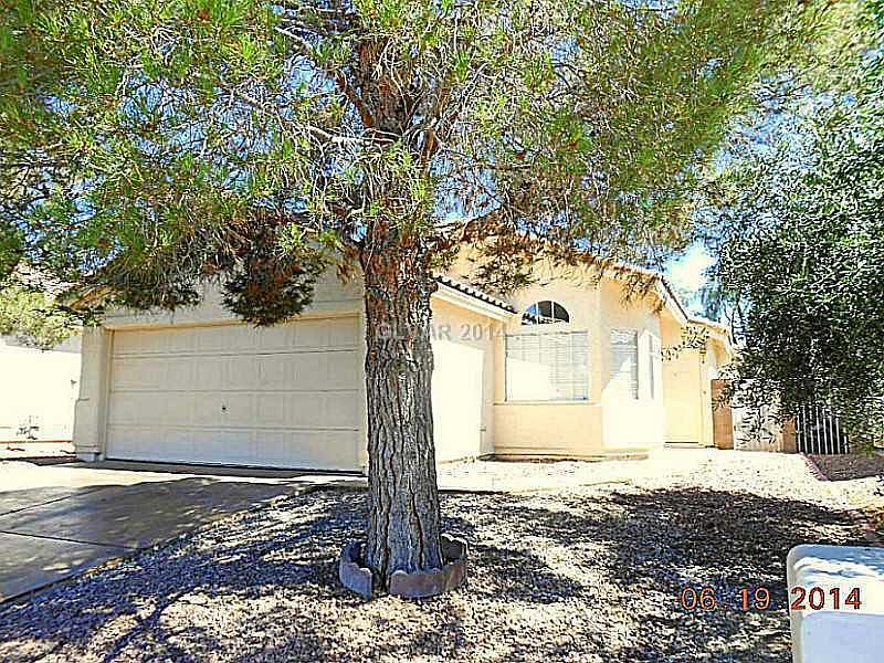 Exterior with Tree for Shade and 2 Car Garage