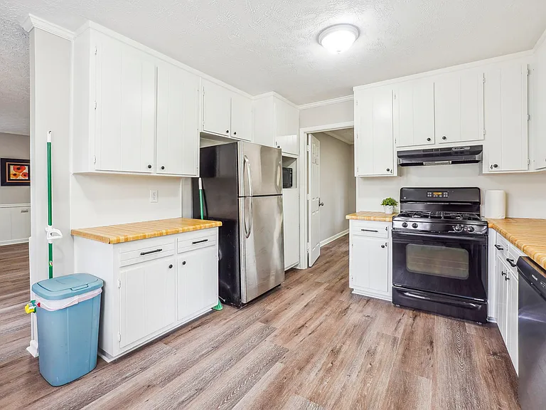Cabinets and drawers are marked with room number.
