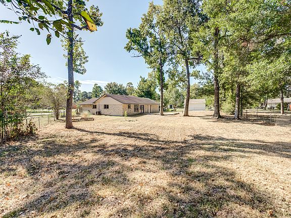 Endless possibilities in this almost half acre yard! Envision yourself enjoying the evenings in the peace of the woods, without sacrificing your amenities!