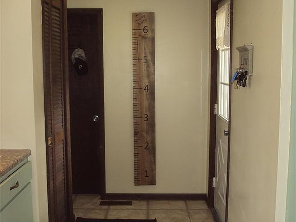 Back entry with half bath and closet