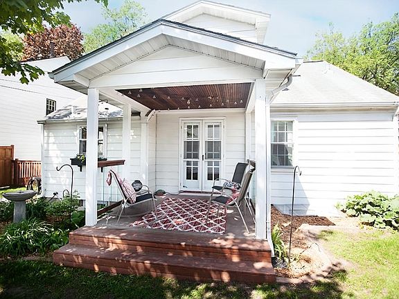 This beautiful backyard will draw you in for lemonade on a hot day. Relax and enjoy the private and completely fenced in area. Gorgeous gardens and flowers surround the property.