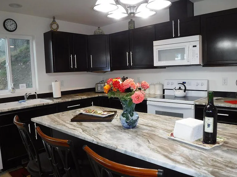 Large, well-stocked, open kitchen dining area floor plan.