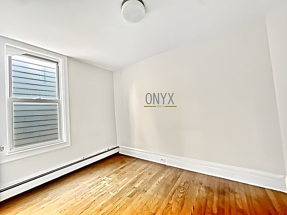 3rd image of 6430 68th Ave APT 2F