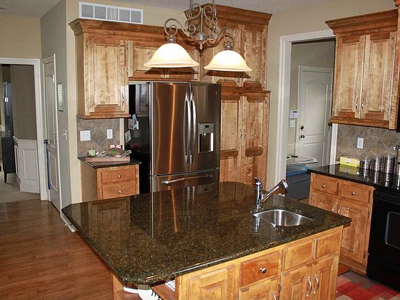 Granite countertops and SS fridge
